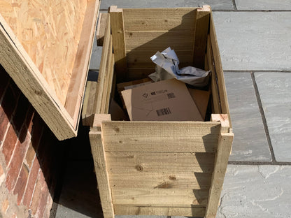 DelSafe wooden parcel delivery box open with parcels stored safely inside